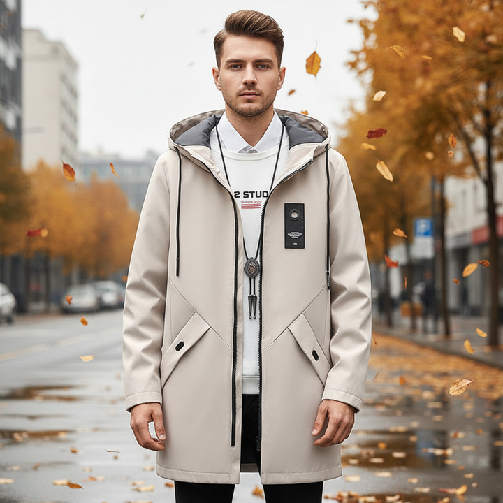 Men's long hooded winter jacket in black, front view, with pockets and zipper closure, for cold weather.