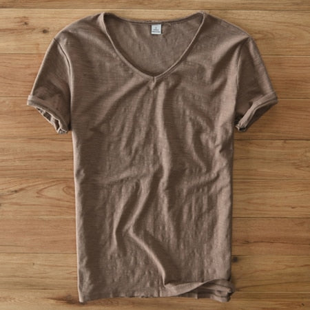 White V-neck linen blend shirt from Luca collection, perfect for a relaxed yet stylish look