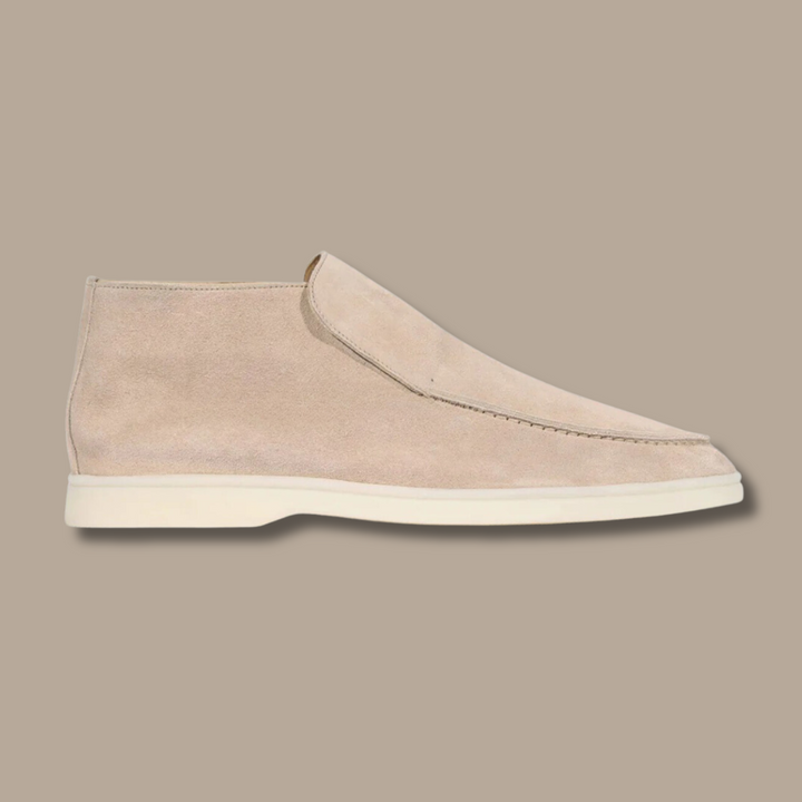 Refined men's slip-on loafers. Classic yet modern all-season footwear for versatile formal and casual styles.