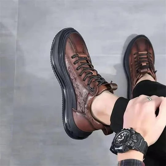 White men's air cushion sneakers, offering luxury comfort and a fresh, modern design for spring.