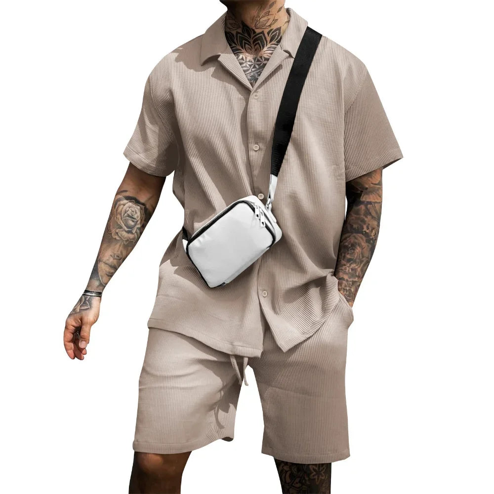 Stylish Milan men's summer vacation outfit: grey polo button-down shirt and comfortable shorts