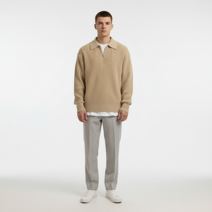 Detail of the durable zipper on the Noah men's polyester sweater, suitable for versatile styling.