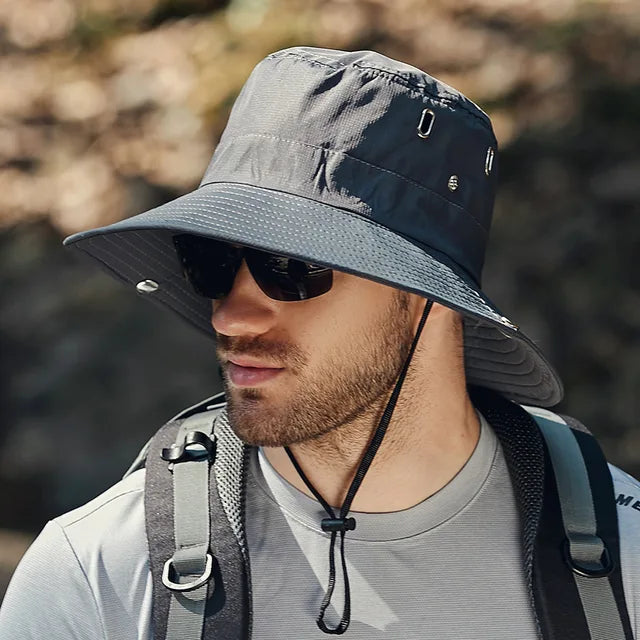 Khaki men's fishing bucket hat for sun protection, made from durable polyester for hiking.
