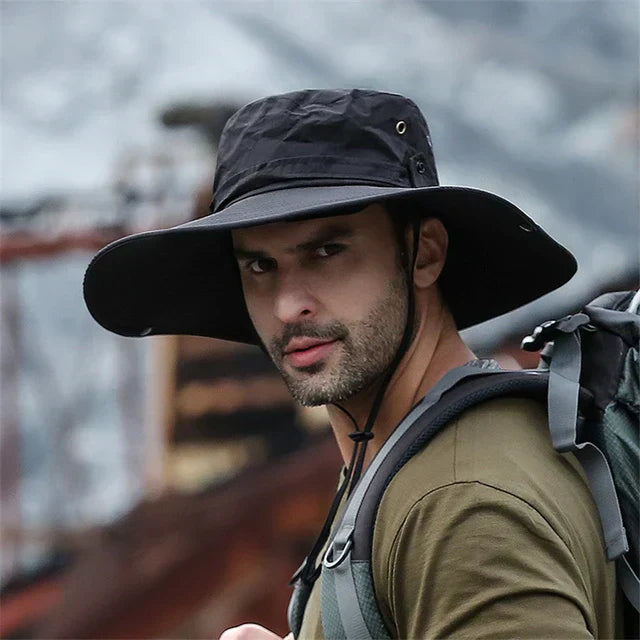 UPF 50+ men's sun protection bucket hat for summer hiking & fishing. Wide brim, breathable fabric.