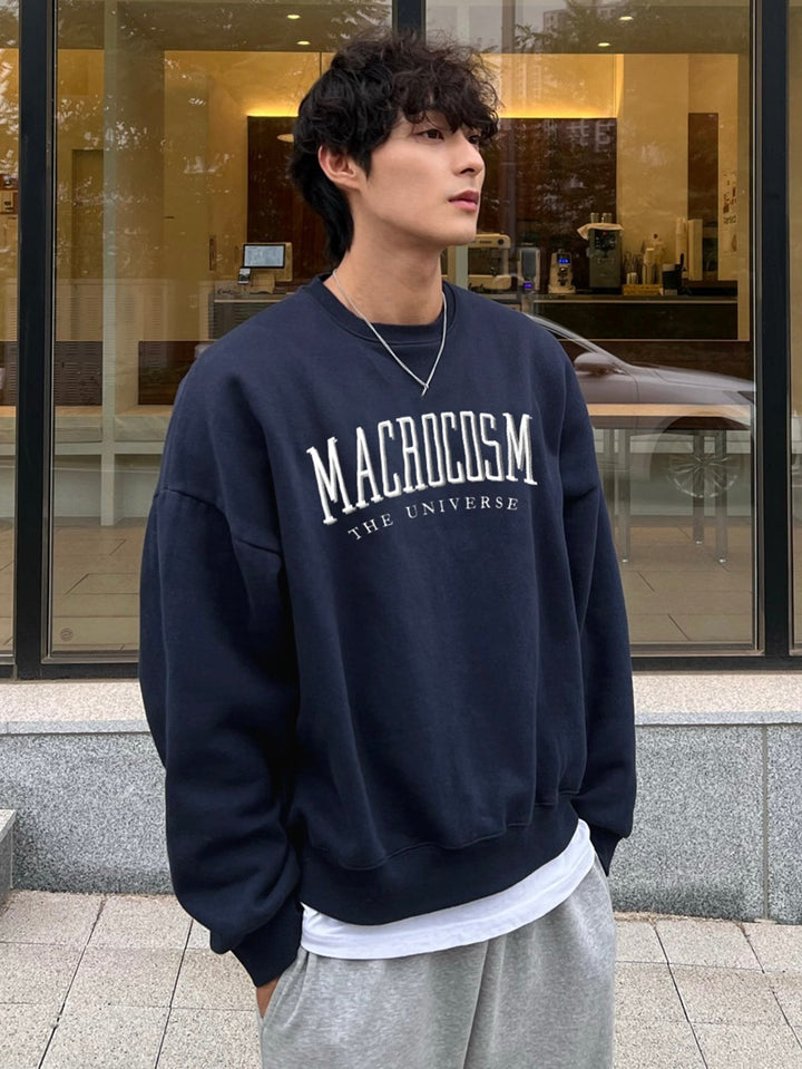 Soft men's oversized graphic sweatshirt, a comfy long sleeve crewneck ideal for relaxed everyday fashion & streetwear.