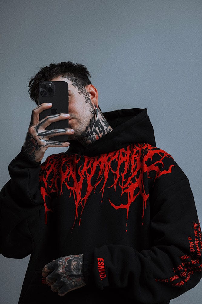 Comfortable men's oversized graphic hoodie, a relaxed fit streetwear staple with urban appeal.