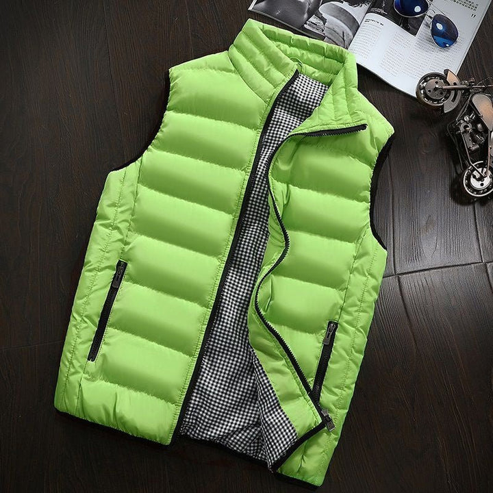 Durable men's padded gilet, water-resistant with a practical stand-up collar. Essential outerwear for cool weather.