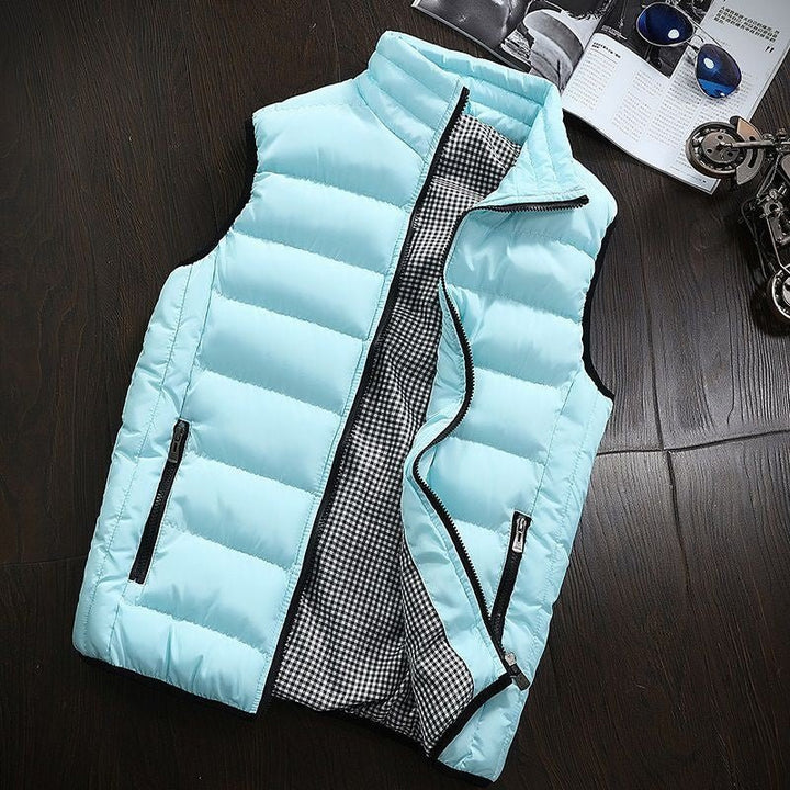 Men's water-resistant padded gilet vest. Lightweight, with a stand-up collar, perfect for transitional outdoor fashion.