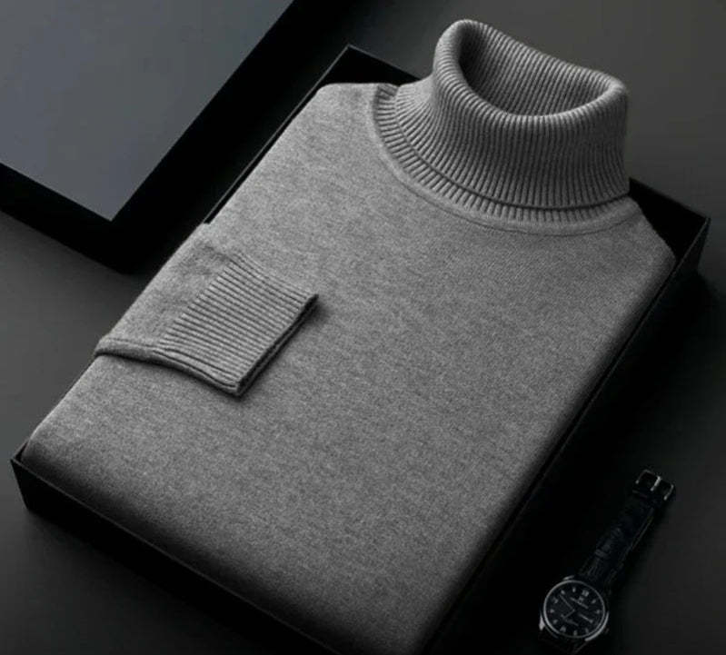 Close-up of a men's premium roll neck sweater, showcasing soft knit texture for elegant and comfortable wear.