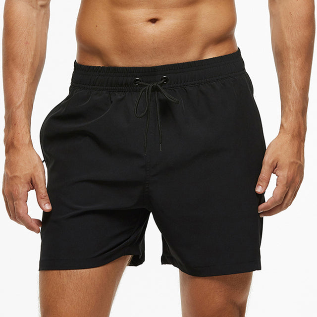 Men's summer swim shorts, quick-dry fabric & elastic waist. Perfect for beach, pool, and casual vacation wear.