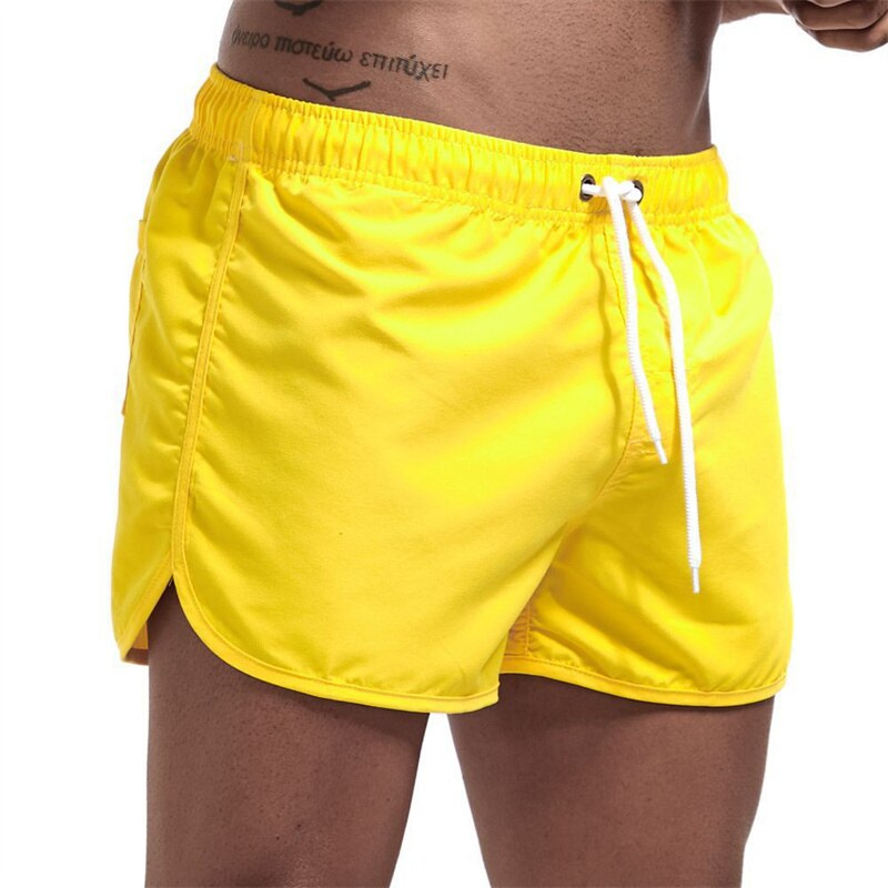 Versatile men's pool shorts with a comfort waistband and quick-dry material, great for an active summer.