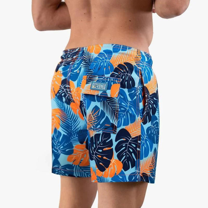 Back view of men's 'Julien' printed swim shorts, highlighting fit and quick-dry performance.