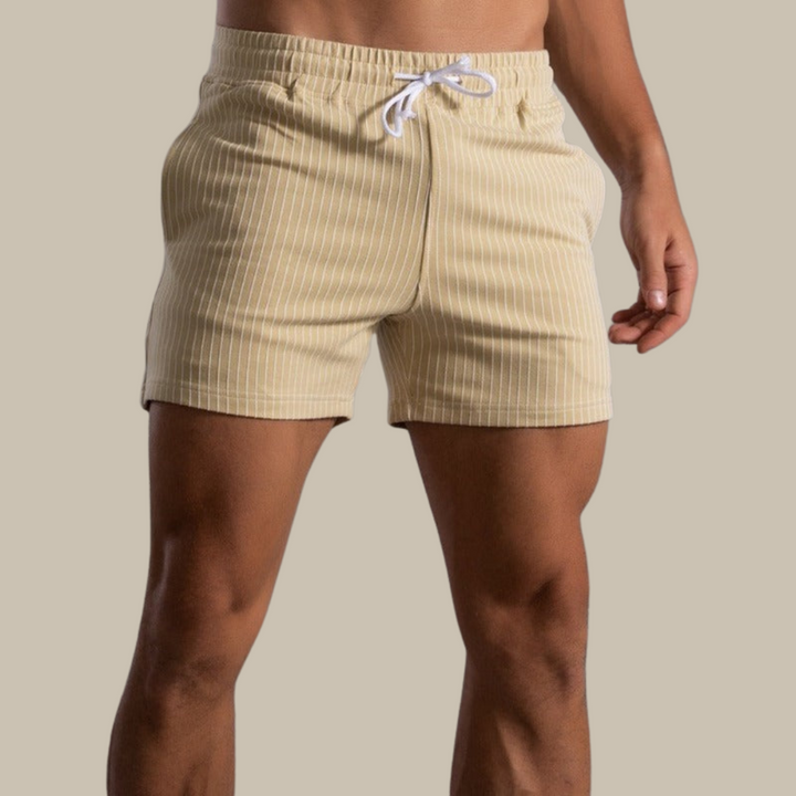 Men's quick-dry swim shorts with built-in support. Stylish beachwear for summer.
