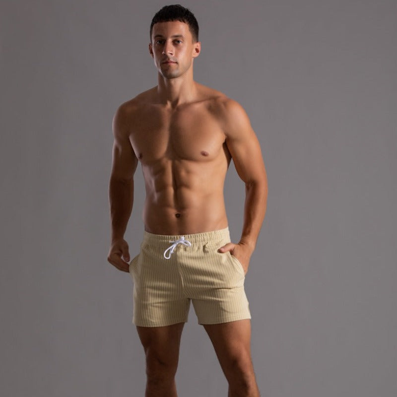 Men's stylish swimwear, quick-drying ripstop fabric, suitable for beach & pool.