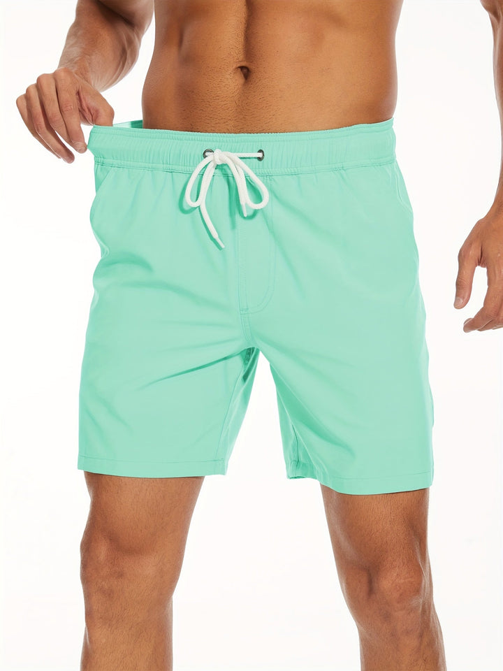 Men's quick-dry swim shorts with stretch fabric, perfect for beach, pool, or active summer wear.