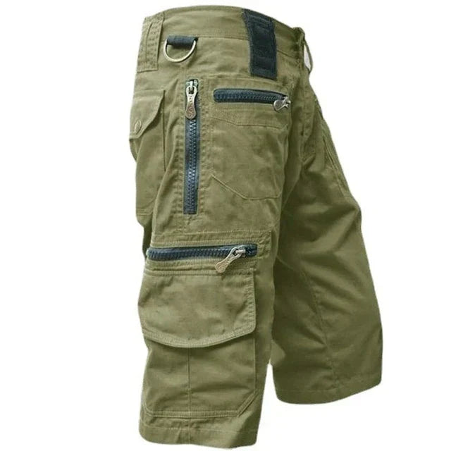 Close-up of fabric texture on men's quick-dry outdoor cargo shorts, perfect for travel & hiking gear.