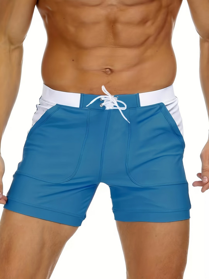 Men's breathable beachwear, quick-drying shorts in a vibrant color for active summer days.