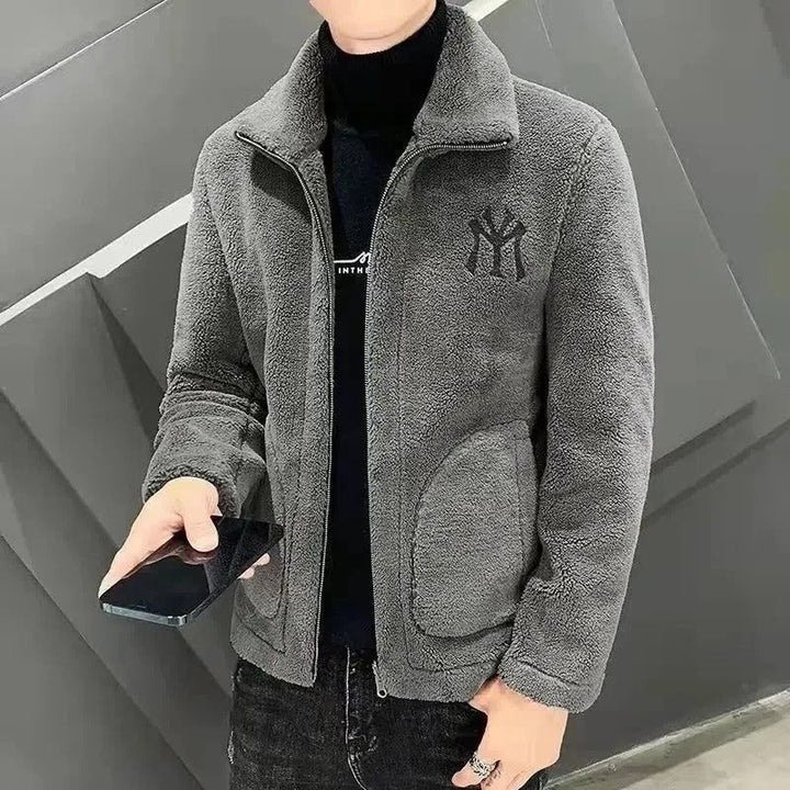 Men's winter padded jacket featuring a durable quilted pattern and a protective stand-up collar. Warm & casual.