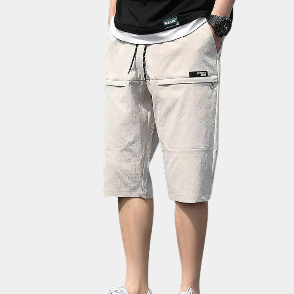 Men's relaxed fit cargo shorts in khaki, ideal for casual summer wear and holidays.