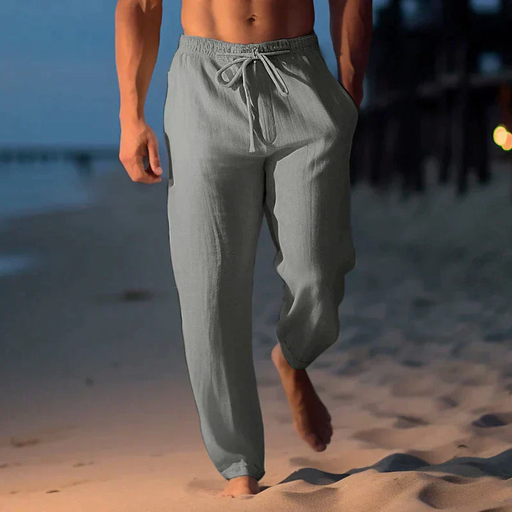 Comfortable men's apparel: relaxed fit linen trousers, adjustable waist, great for warm weather.