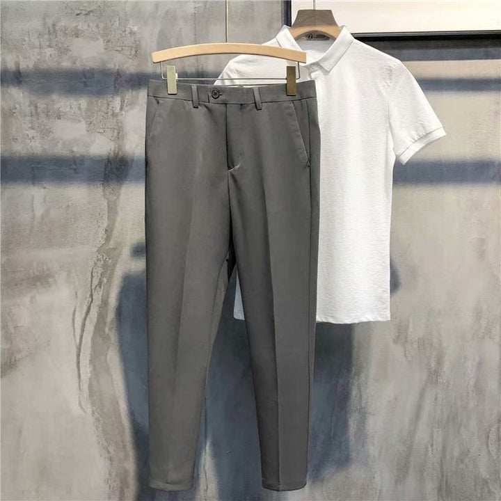 Professional men's slim fit stretch dress pants, essential for the office and formal settings.