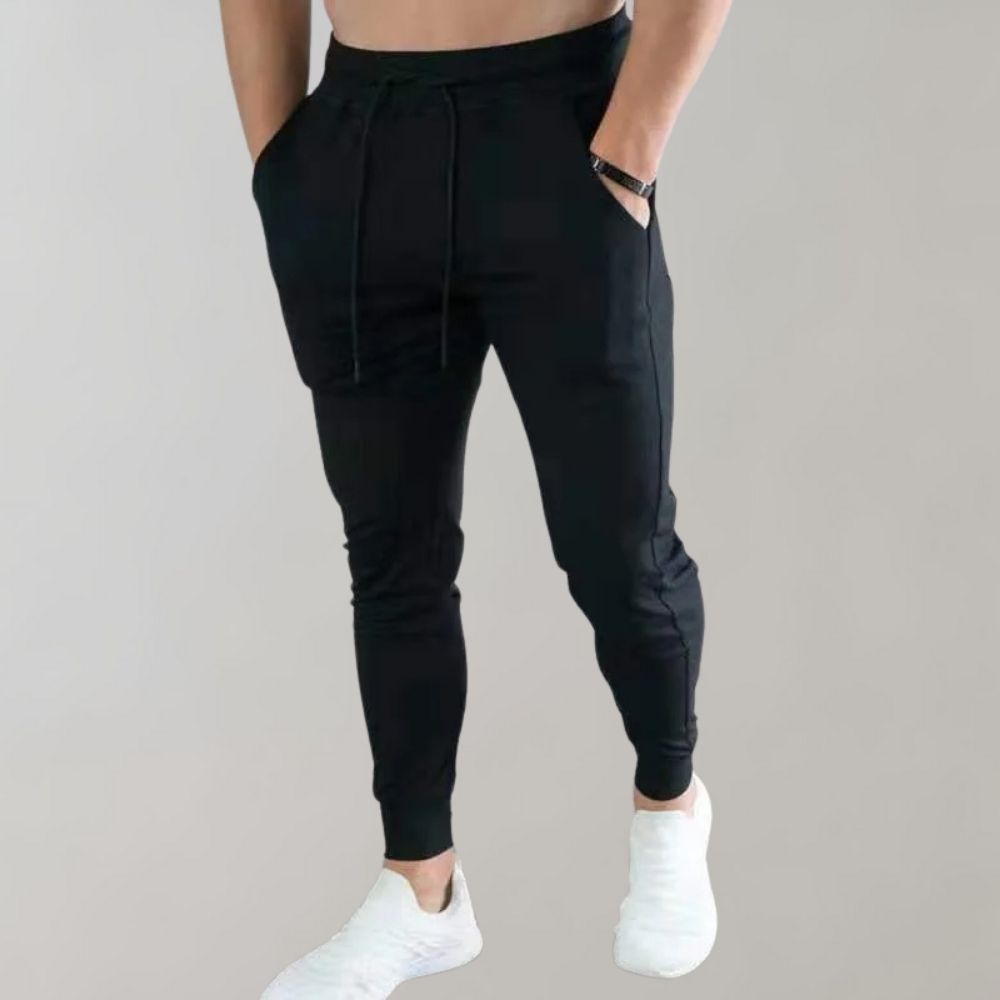 Men's slim fit jogging trousers by Niko. Ideal for athletic activities, workouts, or casual everyday wear.
