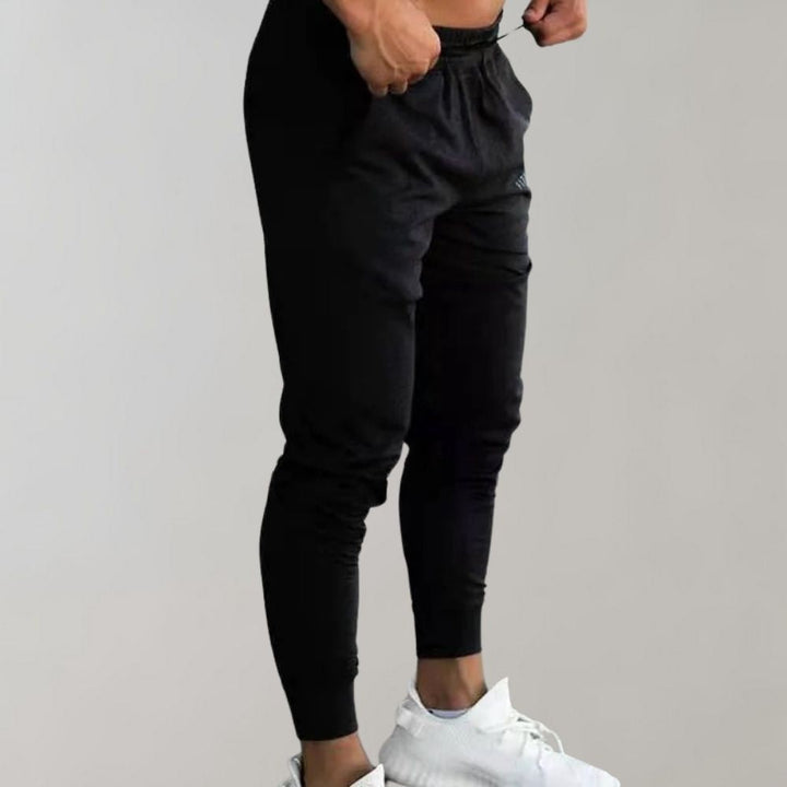 Active men's slim fit joggers "Orion" providing comfort & flexibility for workouts or leisure.