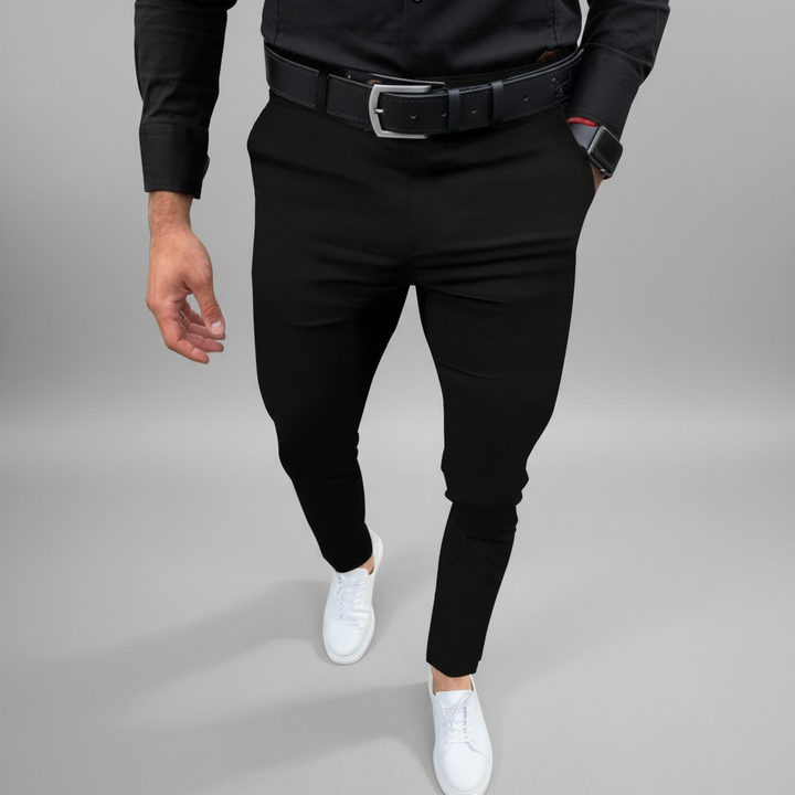 Close-up of men's slim fit stretch trousers fabric, highlighting the quality cotton blend material.
