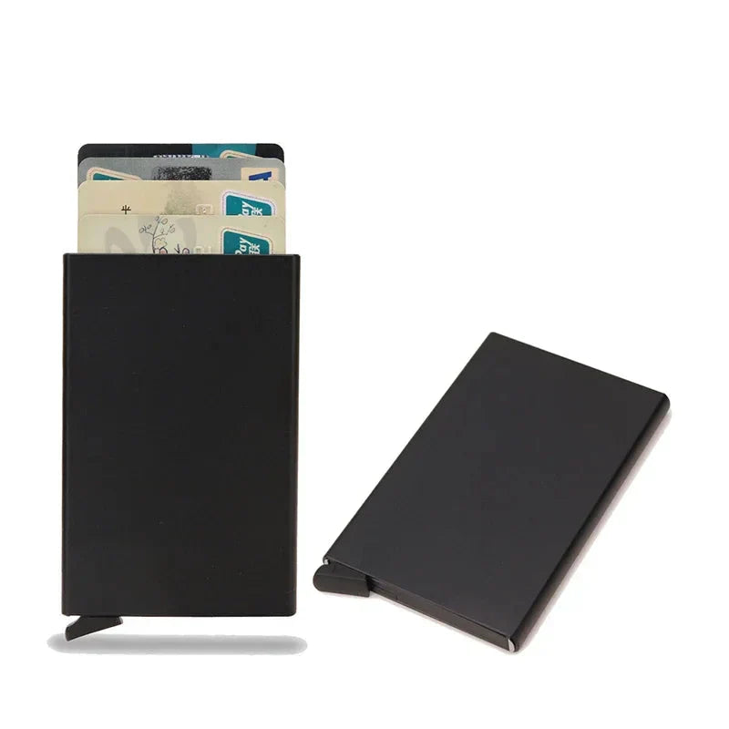 RFID blocking metal wallet next to a smartphone, highlighting its compact and smart design