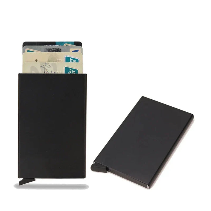 RFID blocking metal wallet next to a smartphone, highlighting its compact and smart design