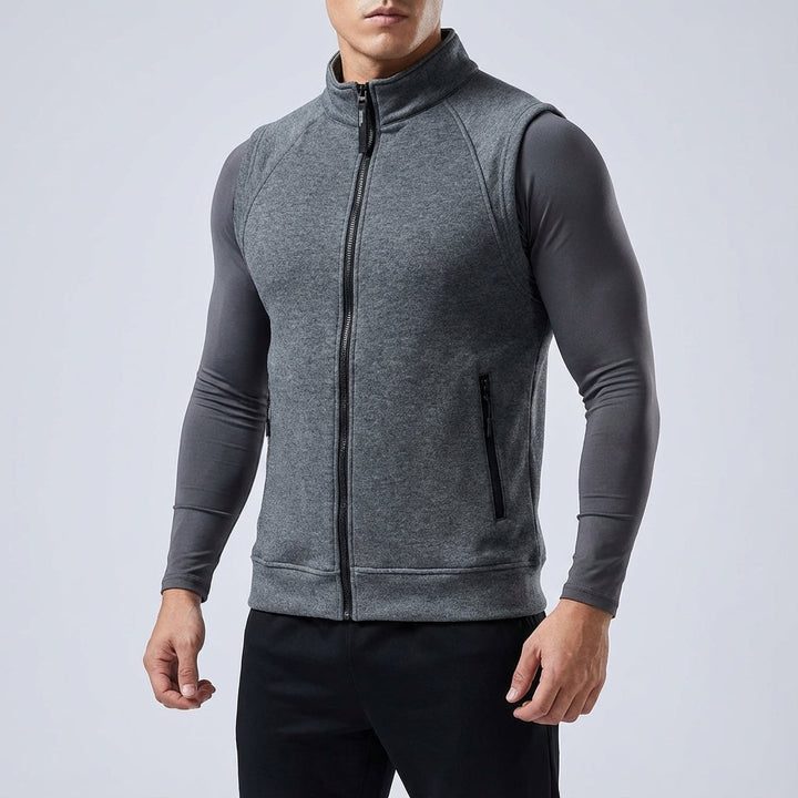 Men's activewear gilet, padded for warmth with a soft fleece lining and practical zipped pockets.