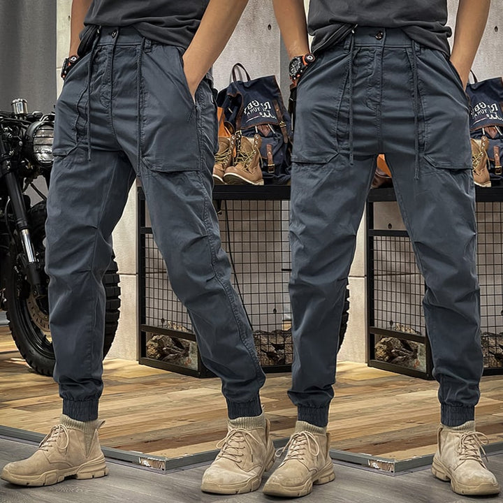 Men's stretch cargo pants for active lifestyles, comfortable & durable. Ideal for travel, hiking & casual wear.