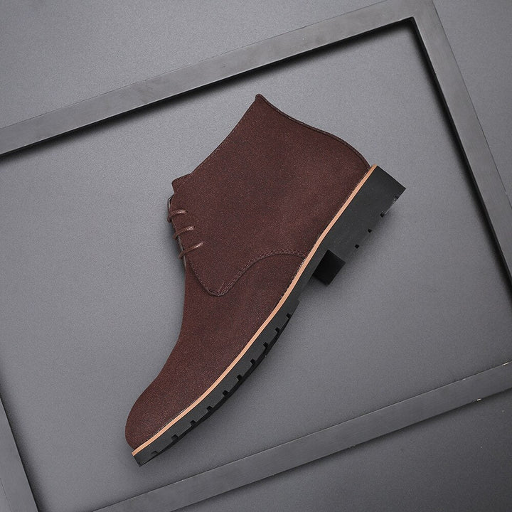 Classic blue men's ankle boots with easy slip-on design. Stylish and comfortable casual footwear.
