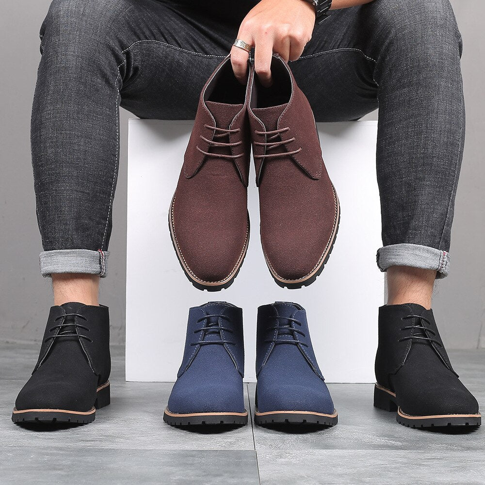 Men's stylish brown ankle boots for spring fashion. Comfortable slip-on casual footwear for everyday wear.