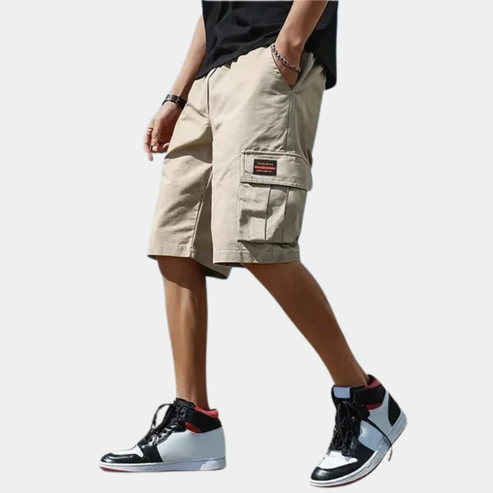 Relaxed fit men's cargo shorts with multiple pockets, ideal for travel and utility in a trendy style.