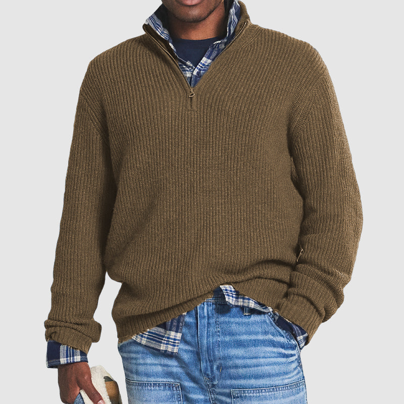 Modern men's fashion: a stylish half-zip pullover sweater, perfect for a contemporary casual look.