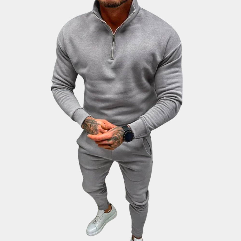Men's versatile half-zip sweater from a comfortable tracksuit set. Ideal for loungewear or athletic activities.