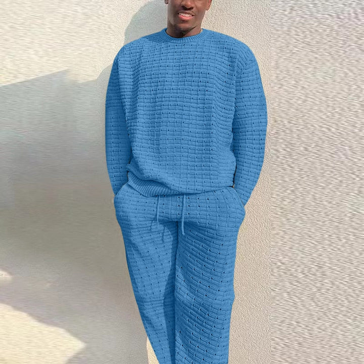 Men's two-piece knitted summer outfit: short-sleeve shirt & matching shorts. Breathable cotton for casual style.