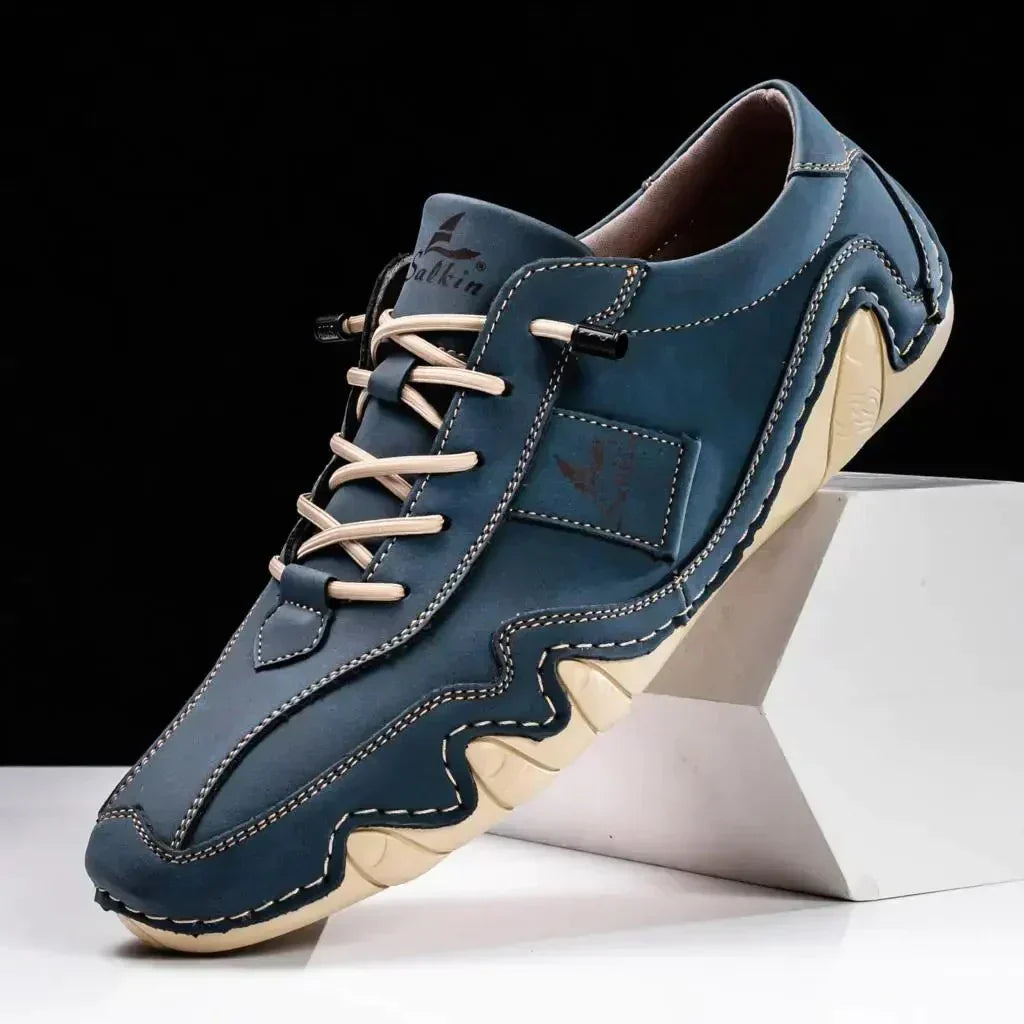Men's stylish leather loafers with enhanced grip sole, offering comfort & versatile fashion.