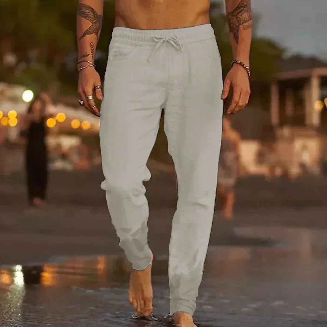 Relaxed fit linen trousers for men, ideal for casual summer outfits.