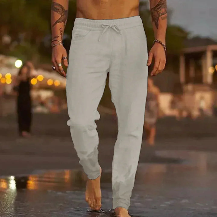 Relaxed fit linen trousers for men, ideal for casual summer outfits.