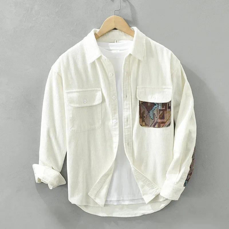 Casual men's long sleeve shirt with trendy patchwork detailing and chest pockets. Versatile cotton top.