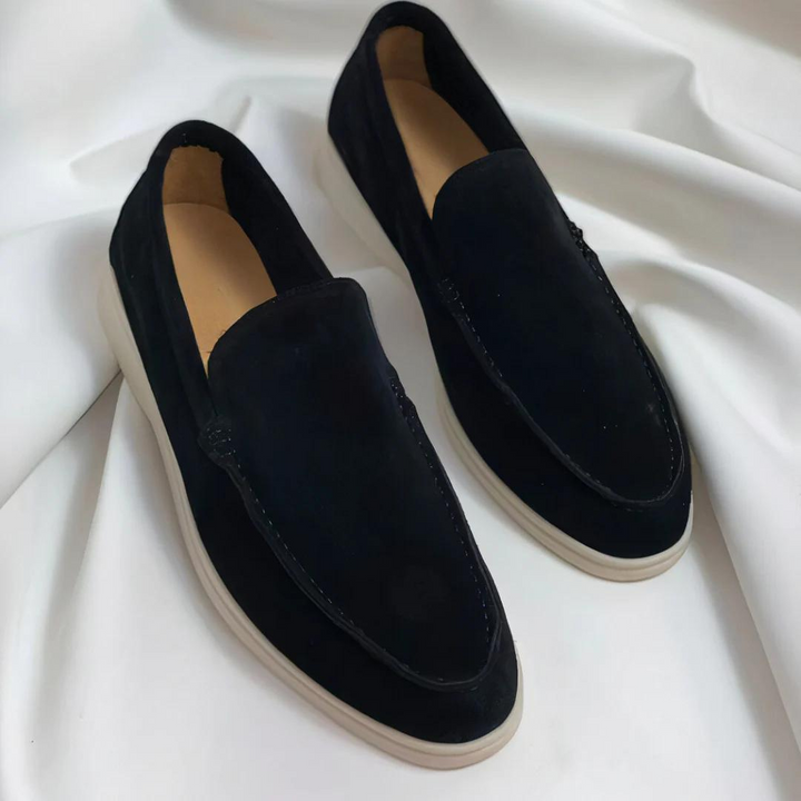 Comfortable men's slip-on loafers. Stylish dress shoes suitable for office wear, casual outings, or evening events.