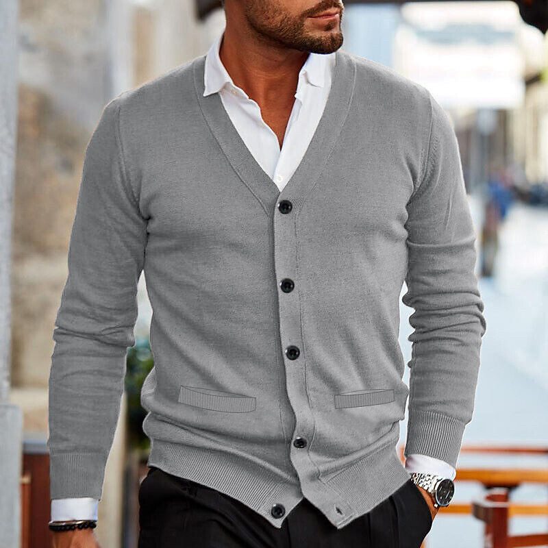 Stylish men's V-neck cardigan, a key piece for any wardrobe. Easily pairs with shirts for a polished layered look.