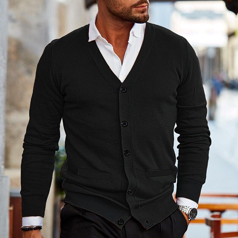 Close-up of a men's V-neck cardigan showing quality button closure and soft fabric texture. Mens fashion top.