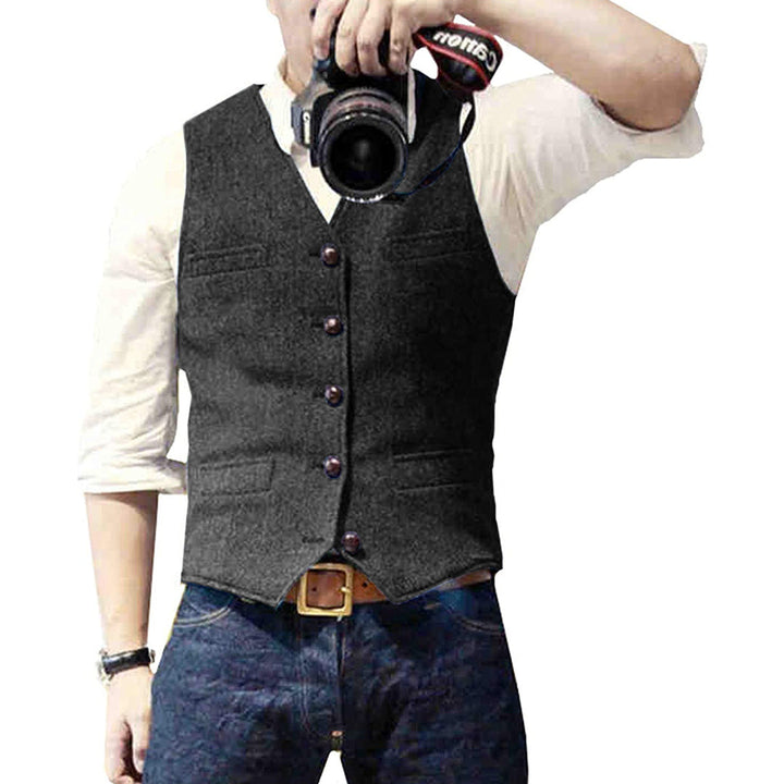 Close-up of a men's stylish wool blend gilet, showing fabric texture, buttons, and tailored details.