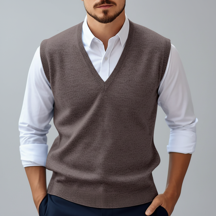 Stylish men's tailored sleeveless gilet made from knitted cotton, featuring a classic V-neck.