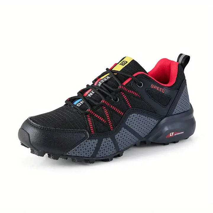 Man wearing TrailStep Pro men's hiking shoes, walking on a rocky mountain path, comfortable and supportive