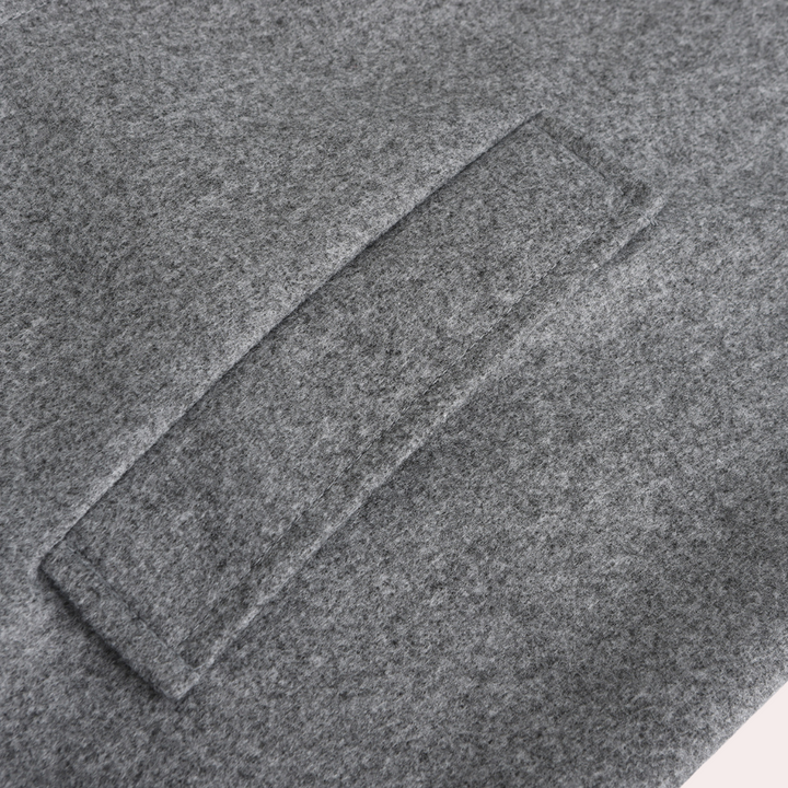 Sophisticated men's classic winter coat. Essential trendy fall outerwear for modern men's fashion.