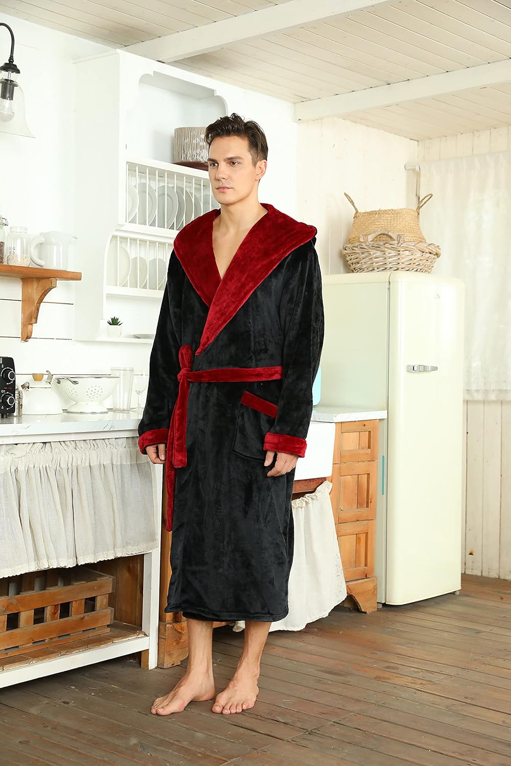 Men's black fleece hooded bathrobe, perfect for chilly mornings.